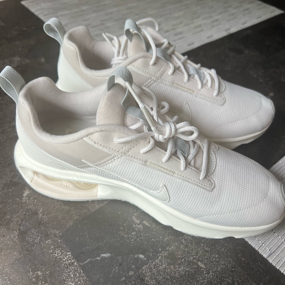 Nike White Sneakers with Air Cushioning